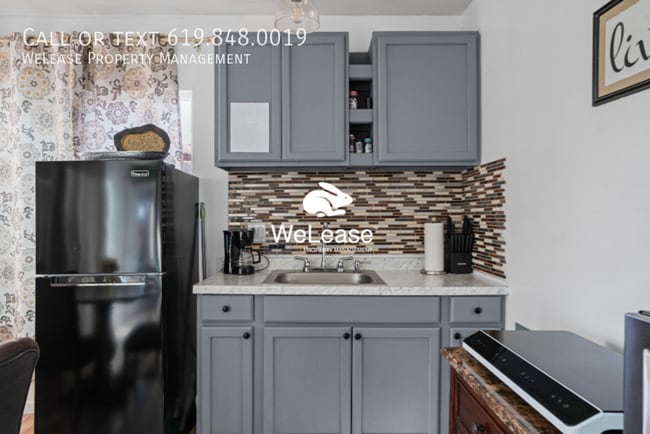 Building Photo - Modern 1-Bedroom, 1-Bathroom Unit in Prime...