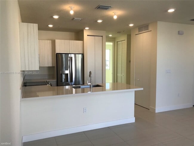 Building Photo - 3 br, 2 bath House - 6416 NW 102nd Ct Apt 306