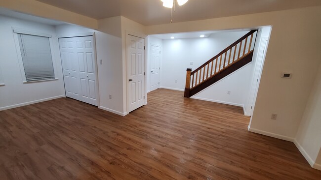 Living Room looking at staircase - 603 E Atlantic Ave