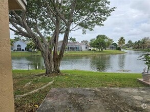 Building Photo - 9478 Palm Cir S