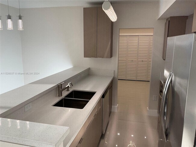 Building Photo - 10185 Collins Ave