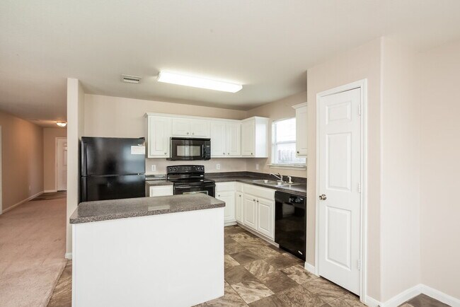 Foto del edificio - 6823 Dawn Bloom Ln