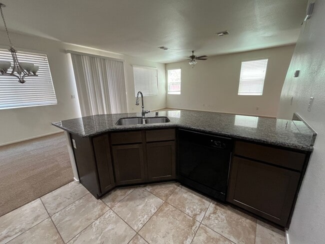 Building Photo - Lovely 2 story home with 3 large bedrooms, 2.5 baths and a 2 car garage.
