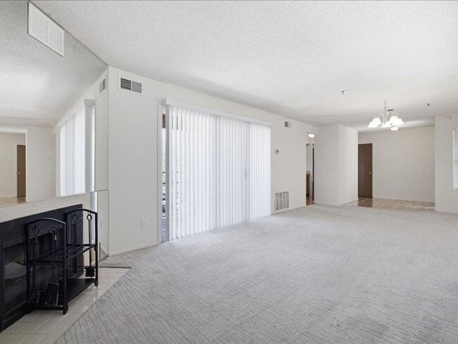 Building Photo - Breathtaking Mountain Views from Dual Balconies – Spacious 2 Bed / 2 Bath