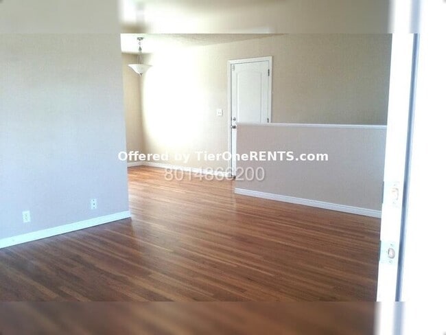 Building Photo - Charming 4-Bedroom Home with Hardwood Floo...