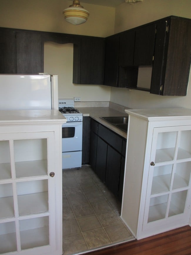 brown kitchen - The Wellington