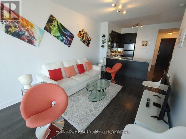 Photo du bâtiment - 60-3460 Absolute Ave