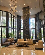 Building Photo - 10175 Collins Ave