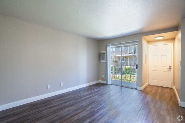 1BR, 1BA - 649SF with White Cabinets - Living Room - Alderwood Park Apartments