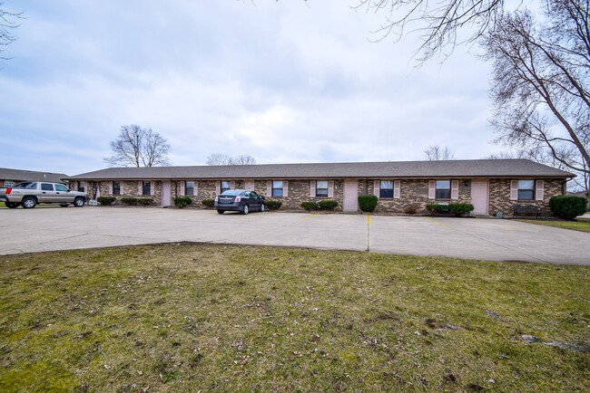 Meadow View Village consists of 33 single story easy living apartments - 3425 Lilac Ln