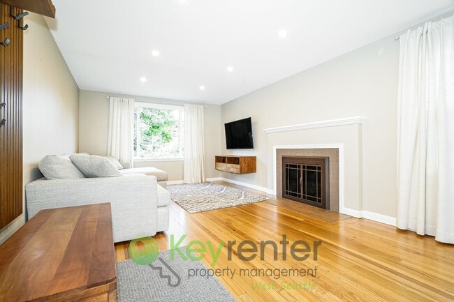 Building Photo - Remodeled Five Bedroom Retreat with Yard a...