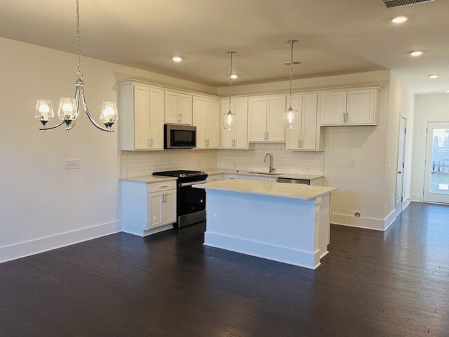Building Photo - BRAND NEW Townhome located across from Wes...