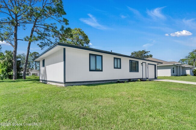 Building Photo - 322 Ixora Ave NW