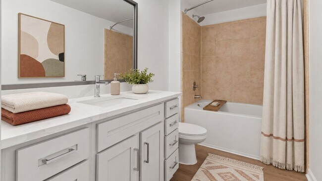 Baños reformados con acabados modernos. - Dwell at McEwen