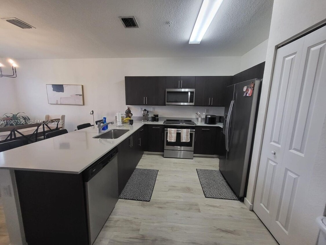 Photo - 15520 SW 136th Street 209, Miami, FL 33196