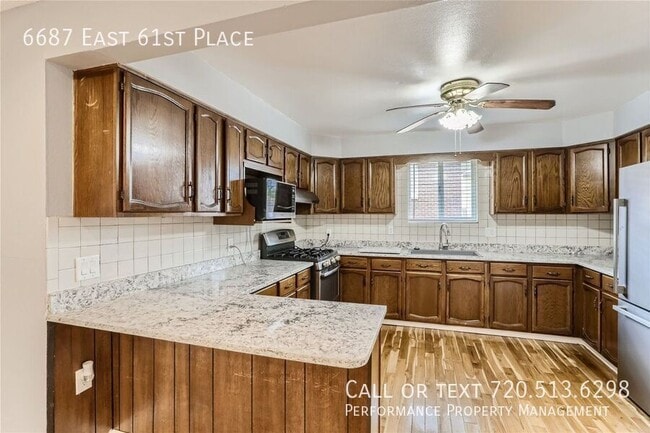 Foto del edificio - 6687 E 61st Pl