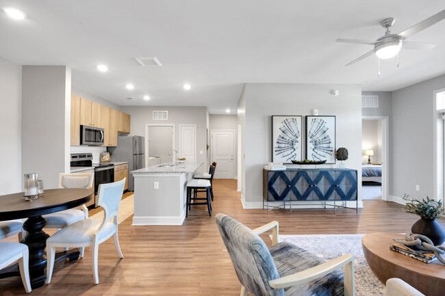 Living Room, Dining Area, and Kitchen - Argento at Riverlights Apartments