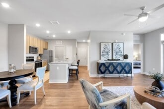 Living Room, Dining Area, and Kitchen - Argento at Riverlights Apartments