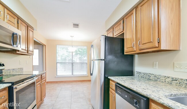 Building Photo - 3 br, 2 bath House - 8807 Enchanted Forest Dr