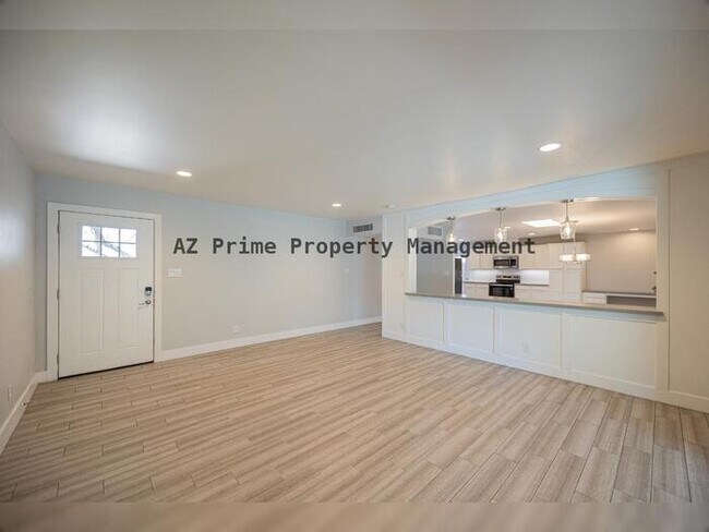 Foto del edificio - 8447 E Lewis Ave