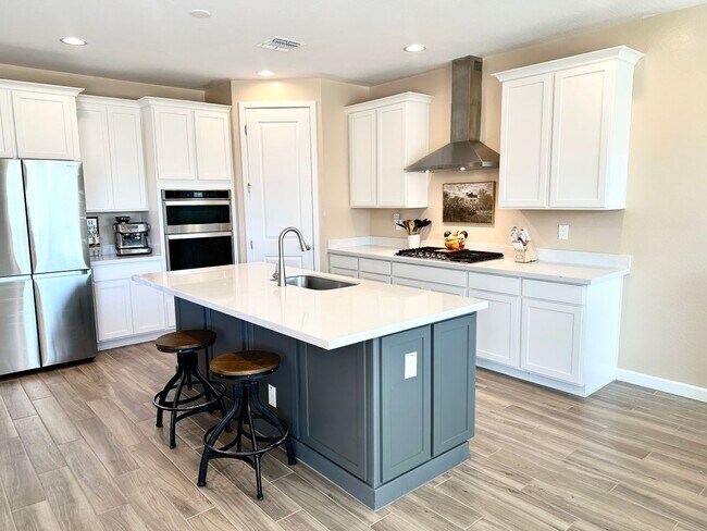 Building Photo - One year old, 3 bedroom, 2.5 bath surround...