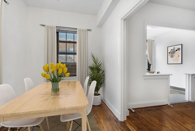 Dining and sunroom (virtually staged) - The Chalfonte