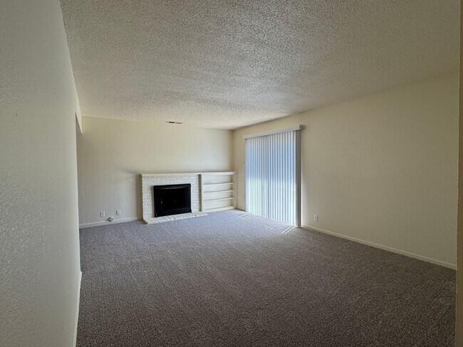 Building Photo - Three Bed, Two Bath Home with New Carpet a...