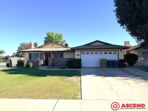 Building Photo - 5213 Lowen Ave