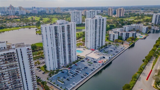 Building Photo - 3675 N Country Club Dr