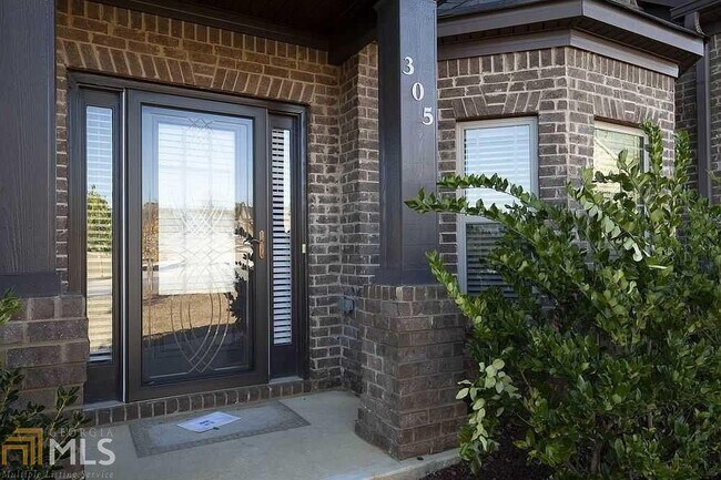 Building Photo - 305 Mango Ct
