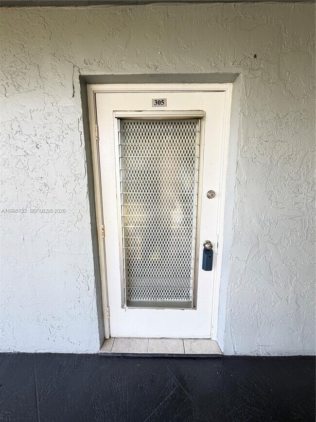 Building Photo - 9201 Lime Bay Blvd