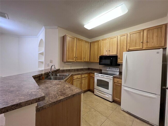 Foto del edificio - 10105 Courtney Oaks Cir