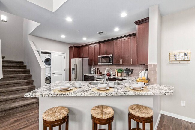 Kitchen boasts with quarts countertops, stainless steal appliances, and beautiful cabinetry - 2511 W Queen Creek Rd