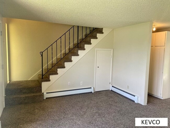 Building Photo - Charming Brick Two-Story Townhouse with Patio