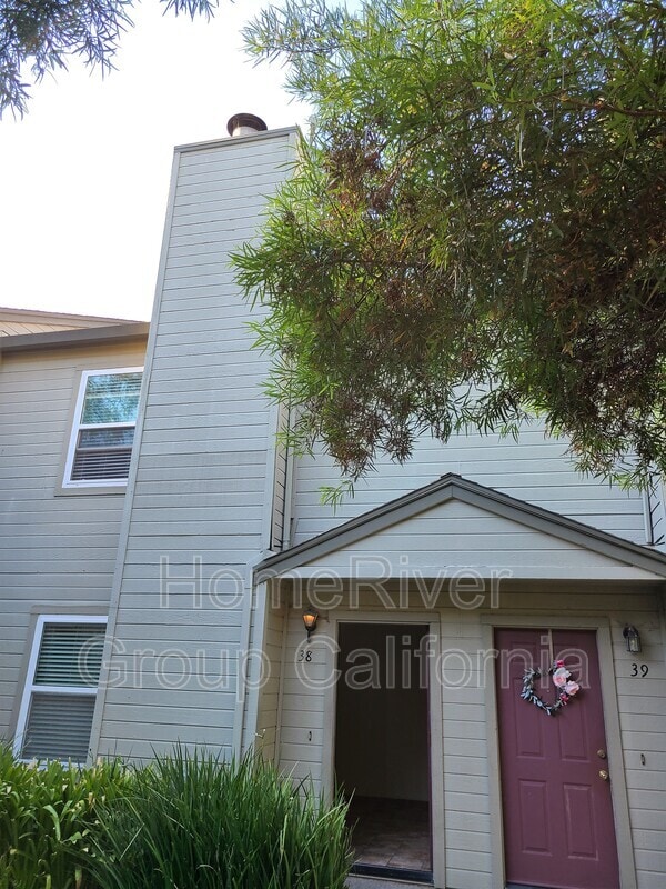 Building Photo - 9127 Newhall Dr