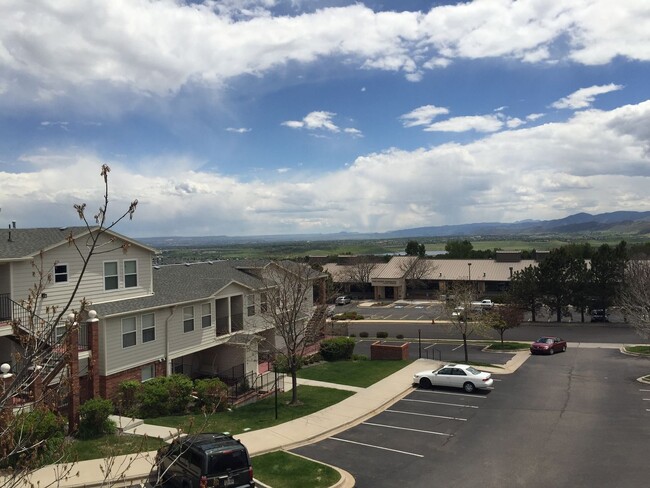 Building Photo - **Coming Soon** 2 Bed/2 Bath Top Floor Condo with Covered Garage Space and Additional Storage