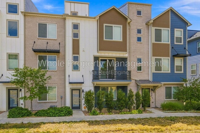 Photo - 12231 West 57th Drive Townhome