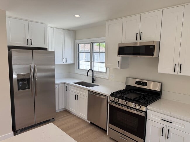 Building Photo - Stunning Fully Renovated Home in Prime Bur...