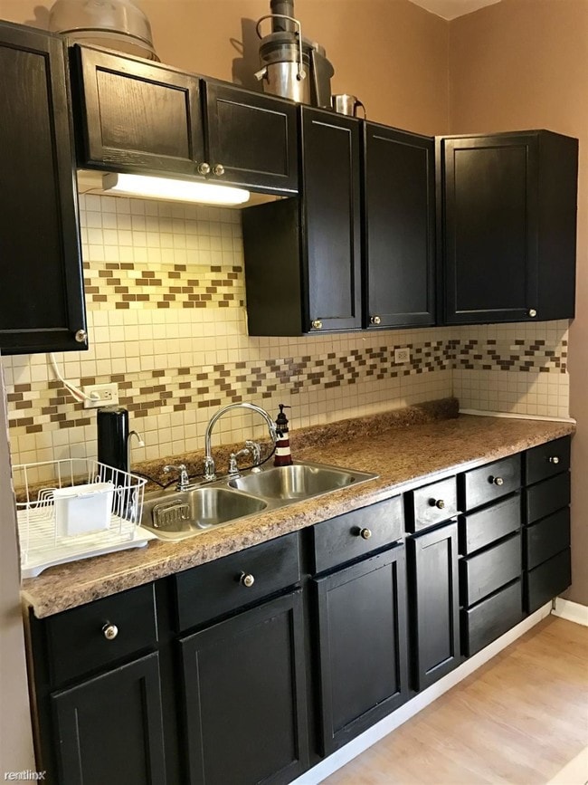 Building Photo - 2 br, 1 bath 4plex - 2054 W 18th Pl Apt 2F