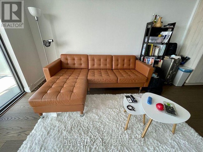 Building Photo - 11 Wellesley St W