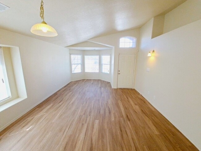 Building Photo - Gorgeous 4-bedroom, 2-bath home featuring two spacious living areas