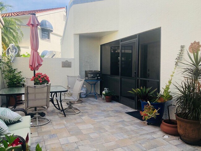 Photo - Experience the Gated Waterfront Community,... House