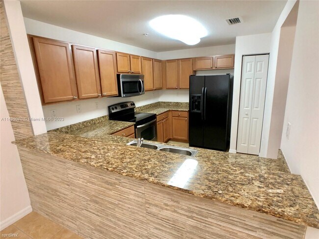 Foto del edificio - 3 br, 2 bath House - 8800 NW 107th Ct Unit...