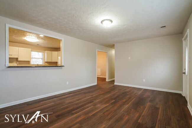 Building Photo - The living is easy in this 3 bedroom, 1.5 ...