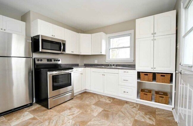 Photo du bâtiment - 310 Mason Ave