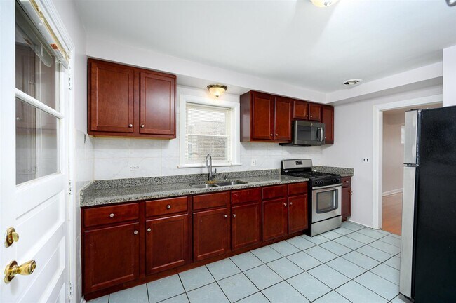 Building Photo - 5439 W Schubert Ave