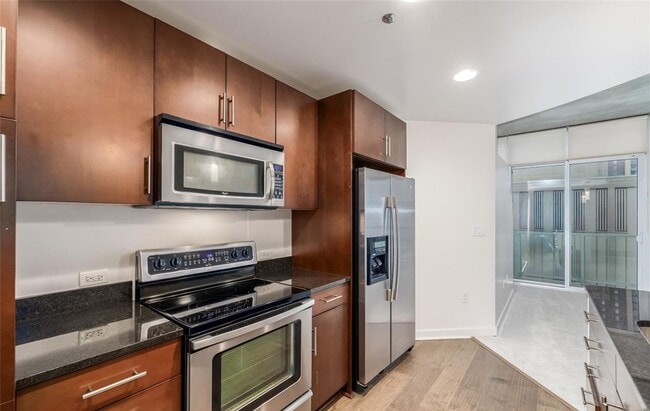 Building Photo - 1BD, 1BA Condo at The Spire with Bonus Fle...