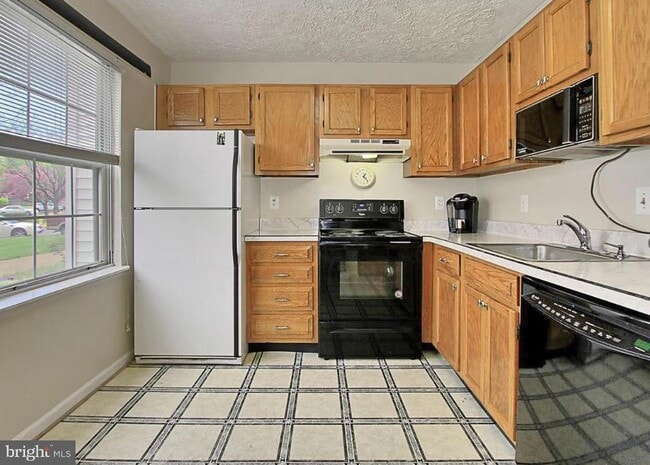 Building Photo - 8607 Woodhue Ct