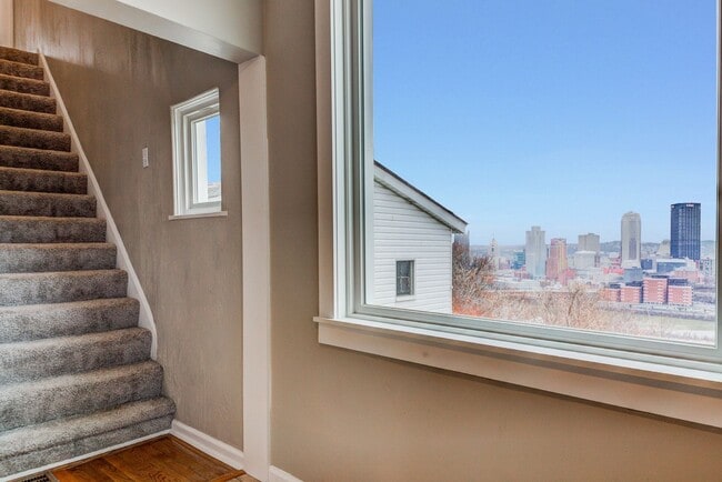 Photo - Available JULY 2026  - RENOVATED 3 Bedroom Home w/ Garage, City Views + MORE!