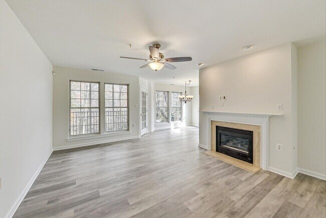 Photo - READY TO GO!!! Renovated 2BD/2BA with 1 Reserved Parking Space & screened in rear porch Apartment